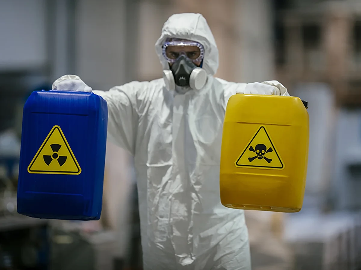 Biohazard cleanup technicians in protective equipment at a remediation scene in Wausau, WI